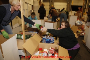 Friday, February 15, 2013.   Volunteers Lucinda Knopp (R) and Linda Peterson pack an assortment of