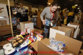 Friday, February 15, 2013.   Volunteer Molly Farr packs an assortment of