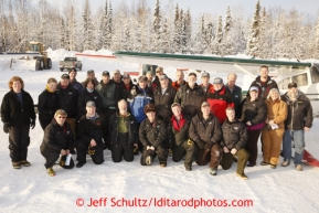 February 16, 2013  Iditarod Air Force pilots and logistics volunteers pose for a photo at the Willow airport during the first day of the