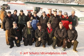 February 16, 2013 Volunteer Iditarod Air force pilots pose for a photo at the Willow airport during the first day of the