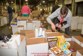 Some of the  food for being sent out on the trail for  the volunteers which will be working at the 20+ checkpoints durinig this year's 2016 Iditarod Race at the Airland Transport warehouse in Anchorage on Friday, February 19, 2016.