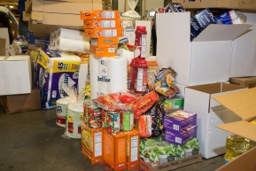 Some of the  food for being sent out on the trail for  the volunteers which will be working at the 20+ checkpoints durinig this year's 2016 Iditarod Race at the Airland Transport warehouse in Anchorage on Friday, February 19, 2016.