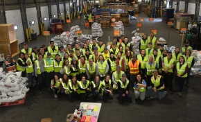 Iditarod volunteers process musher food drop bags for the 2020 Iditarod Trail Sled Dog Race at Aril Land Transport in Anchorage, AK on Wednesday, February 19, 2020. The bags with food and equipment will be shipped to Iditarod checkpoints along the trail. (Photo by Bob Hallinen)