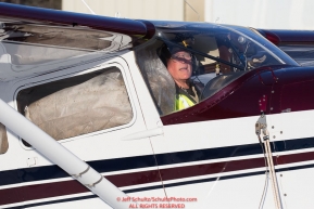 Volunteer Iditarod Air Force pilot, Joe Pendergrass taxis with a load of hay, musher drop bags, people food and HEET at the Willow, Alaska airport on his way to the Rainy Pass checkpoint during the Food Flyout on Saturday, February 20, 2016.  Iditarod 2016