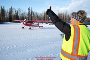 Volunteer, Leslie Washburn gives the