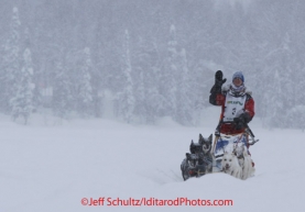 Sunday February 26, 2012   Approaching the finish line on Willow Lake in 4th place, Jesse Klejka of Bethel waves to his family and the crowd.