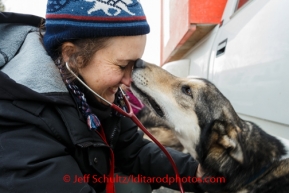 Iditarod Vet Check in Wasilla, AlaskaVeterinarian, Michelle Barton of Australia, checks a dog's paws at the Vet Check at Iditarod headquarters in Wasilla, Alaska, on Wednesday, February 26, 2014.Iditarod Sled Dog Race 2014PHOTO (c) BY JEFF SCHULTZ -- REPRODUCTION PROHIBITED WITHOUT PERMISSION