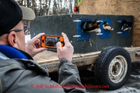 Iditarod Vet Check in Wasilla, AlaskaRace fan, Jerry Talbott of Palisade, Colorado, takes photos of Iditarod dogs during Vet Check day at race headquarters in Wasilla, Alaska, on February, 26, 2014.Iditarod Sled Dog Race 2014PHOTO (c) BY JEFF SCHULTZ -- REPRODUCTION PROHIBITED WITHOUT PERMISSION