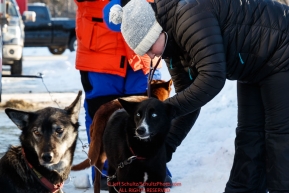Veterinarian checks a dog during the pre-race vet check at Iditarod Headquarters in Wasilla, Alaska. Wednesday February 26, 2019 Photo by Jeff Schultz/  (C) 2019  ALL RIGHTS RESERVED