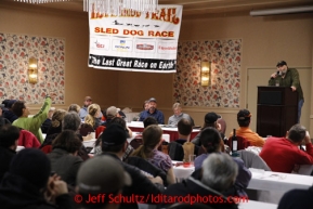 Race Marshal Mark Nordman talks over the rules with mushers during the mandatory musher meeting at the Millenium hotel two days prior to the start of Iditarod 2013.Photo (C) Jeff Schultz/IditarodPhotos.com  Do not reproduce without permission