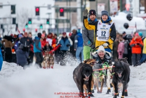 Andy Pohl waves to the crowd as he leaves the start line during the ceremonial start of the 2018 Iditarod in Anchorage, Alaska on Saturday, March 3, 2018.Photo by Jeff Schultz/SchultzPhoto.com  (C) 2018  ALL RIGHTS RESERVED