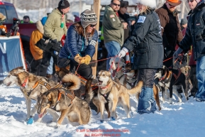Handlers trying to hold back excited dogs on Willow Lake at the Official Start of the 2018 Iditarod Sled Dog Race in Willow, Alaska on March 04, 2018. Photo by Jeff Schultz/SchultzPhoto.com  (C) 2018  ALL RIGHTS RESERVED