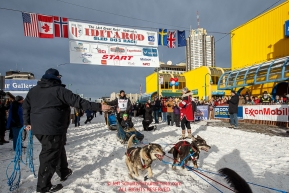 Charley Bejna and team leave the start line on 4th avenue during the Ceremonial Start of the 2016 Iditarod in Anchorage, Alaska.  March 05, 2016