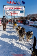 Patrick Beall leaves the start line during the Re-Start of the 2016 Iditarod in Willow, Alaska.  March 06, 2016