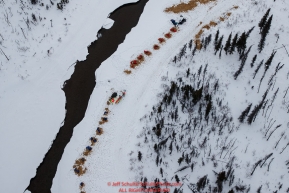 Two teams near a creek with open water 22 miles from the Rohn checkpoint on the way to Nikolai during the 2018 Iditarod race on Tuesday afternoon March 06, 2018. Photo by Jeff Schultz/SchultzPhoto.com  (C) 2018  ALL RIGHTS RESERVED