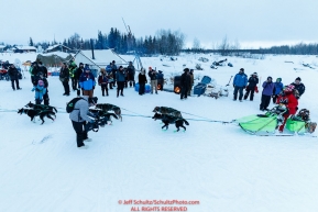 Ryan Redington arrives in first place at the Nikolai checkpoint to a warm welcome of residents during the 2018 Iditarod race on Tuesday morning March 06, 2018. Photo by Jeff Schultz/SchultzPhoto.com  (C) 2018  ALL RIGHTS RESERVED