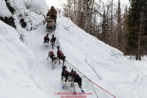 Rick Casillo comes down the Happy River steps on the trail between the Finger Lake and Rainy Pass checkpoint during Iditarod 2016.  Alaska.  March 07, 2016. Photo by Jeff Schultz (C) 2016 ALL RIGHTS RESERVED