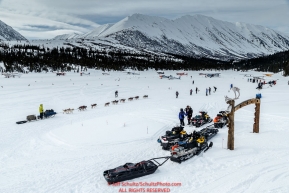 Nicholas Petit runs on Puntilla Lake as he leaves the Rainy Pass Checkpoint during Iditarod 2016.  Alaska.  March 07, 2016.  Photo by Jeff Schultz (C) 2016 ALL RIGHTS RESERVED