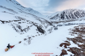 Wade Marrs on the trail along Pass Creek in the Alaska Range after leaving the Rainy Pass Checkpoint on the way to Rohn during Iditarod 2016.  Alaska.  March 07, 2016.  Photo by Jeff Schultz (C) 2016 ALL RIGHTS RESERVED