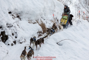 Wade Marrs runs down the last leg of the Happy River steps along the 2016 Iditarod Trail between the Finger Lake and Rainy Pass Checkpoints.  Alaska.  March 07, 2016.  Photo by Jeff Schultz (C) 2016 ALL RIGHTS RESERVED