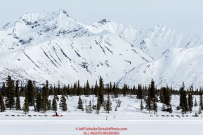 Mitch Seavey leads Rick Casillo on Puntilla Lake at the Rainy Pass Checkpoint during Iditarod 2016.  Alaska.  March 07, 2016.  Photo by Jeff Schultz (C) 2016 ALL RIGHTS RESERVED