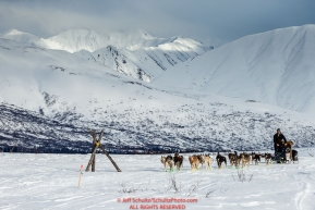 Richie Diehl on the trail in the Alaska Range in Ptarmigan Valley on the way to Rohn from the Rainy Pass checkpoint during Iditarod 2016.  Alaska.  March 07, 2016.  Photo by Jeff Schultz (C) 2016 ALL RIGHTS RESERVED