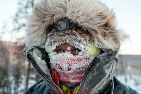 An iced up volunteer at the checkpoint in Manley Hot Springs during the 2017 Iditarod on Tuesday March 7, 2017.Photo by Jeff Schultz/SchultzPhoto.com  (C) 2017  ALL RIGHTS RESVERVED