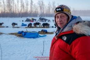 Joe Redington, son of the Father of the Iditarod Joe Redington Sr. looks over the dog lot that he was the lead in organizing at the checkpoint in Manley Hot Springs during the 2017 Iditarod on Tuesday March 7, 2017.Photo by Jeff Schultz/SchultzPhoto.com  (C) 2017  ALL RIGHTS RESVERVED