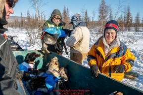 Volunteers load dropped dogs into a trailer to head to the airport for a flight out at the checkpoint in Manley Hot Springs during the 2017 Iditarod on Tuesday March 7, 2017.Photo by Jeff Schultz/SchultzPhoto.com  (C) 2017  ALL RIGHTS RESVERVED