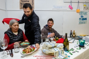 Nicolas Petit and Tanana Elder Blanche Edwin is served by The Lakefront Hotel's Andrew Adlesperger during his