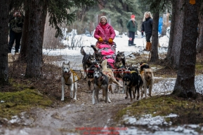 DeeDee Jonrowe leaves the Rohn checkpoint during Iditarod 2016.  Alaska.  March 08, 2016.  Photo by Jeff Schultz (C) 2016 ALL RIGHTS RESERVED