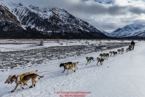 Melissa Owens-Stewart on the trail on the South Fork of the Kuskokwim River after leaving the Rohn checkpoint during Iditarod 2016.  Alaska.  March 08, 2016.  Photo by Jeff Schultz (C) 2016 ALL RIGHTS RESERVED