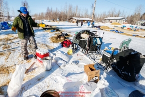 Paul Hansen gets ready to feed dogs at the Tanana checkpoint during the 2017 Iditarod on Wednesday afternoon March 8, 2017.Photo by Jeff Schultz/SchultzPhoto.com  (C) 2017  ALL RIGHTS RESERVED
