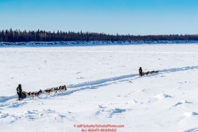 Anna Berington leads her twin sister Kristie down the Yukon River shorlty after leaving the Tanana checkpoint during the 2017 Iditarod on Wednesday afternoon March 8, 2017.Photo by Jeff Schultz/SchultzPhoto.com  (C) 2017  ALL RIGHTS RESERVED