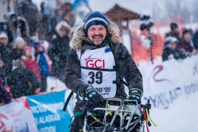 Rookie Tom Frode from Norway smiling at the re-start of the 2020 Iditarod in Willow, Alaska.