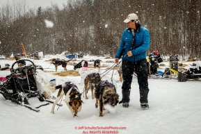 Jessie Royer takes a few dogs for a walk at the Takotna checkpoint while taking a 24-hour layover during Iditarod 2016.  Alaska.  March 09, 2016.  Photo by Jeff Schultz (C) 2016  ALL RIGHTS RESERVED