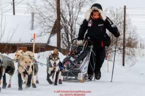 Allen Moore runs up the hill into the Ruby checkpoint during the 2017 Iditarod on Thursday morning March 9, 2017.Photo by Jeff Schultz/SchultzPhoto.com  (C) 2017  ALL RIGHTS RESERVED