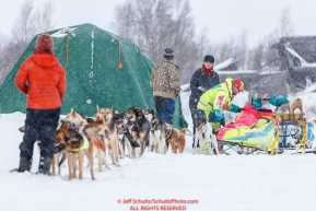 Volunteers check in Monica Zappa at the Iditarod checkpoint on Friday, March 9th during the 2018 Iditarod Sled Dog Race -- AlaskaPhoto by Jeff Schultz/SchultzPhoto.com  (C) 2018  ALL RIGHTS RESERVED