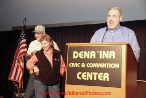 Thursday March 1, 2012  Honorary musher, Dave Olson and his wife Donna, on stage at the Iditarod musher banquet at the Dena'ina Civic and Convention Center in Anchorage, Alaska.