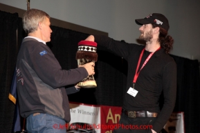 Thursday March 1, 2012  Iditarod musher, Nicholas Petit, draws his starting number at the musher banquet at the Dena'ina Civic and Convention Center in Anchorage, Alaska.