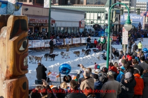 Kelly Maixner drives his dog team along Fourth Avenue during the Iditarod 2014 Ceremonial start in Anchorage, Alaska.Iditarod Sled Dog Race 2014PHOTO (c) BY JEFF SCHULTZ/IditarodPhotos.com -- REPRODUCTION PROHIBITED WITHOUT PERMISSION