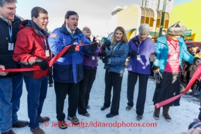 Senator Mark Begich, Mayor Dan Sullivan and Senator Lisa Murkowski join in the official ribbon cutting ceremony during the Iditarod 2014 ceremonial start along Fourth Avenue in Anchorage, Alaska.Iditarod Sled Dog Race 2014PHOTO (c) BY JEFF SCHULTZ/IditarodPhotos.com -- REPRODUCTION PROHIBITED WITHOUT PERMISSION