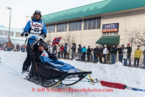 Robert Sorlie, of Hurdal, Norway, drives his dog team and IditaRider along Fourth Avenue during the ceremonial start of Iditarod 2014 in Anchorage, Alaska.Iditarod Sled Dog Race 2014PHOTO (c) BY JEFF SCHULTZ/IditarodPhotos.com -- REPRODUCTION PROHIBITED WITHOUT PERMISSION