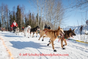Jan Steves drives her dogs through Anchorage, Alaska, during the ceremonial start to Iditarod 2014.Iditarod Sled Dog Race 2014PHOTO (c) BY JEFF SCHULTZ/IditarodPhotos.com -- REPRODUCTION PROHIBITED WITHOUT PERMISSION