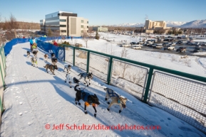 Veteran musher, Matthew Failor, originally from Ohio, drives his dog team along a ski trail near the Alaska Native Hospital during the ceremonial start to Iditarod 2014 in downtown Anchorage, Alaska.Iditarod Sled Dog Race 2014PHOTO (c) BY JEFF SCHULTZ/IditarodPhotos.com -- REPRODUCTION PROHIBITED WITHOUT PERMISSION