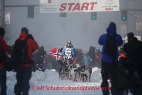 Norwegian Robert Sorlie drives his dog team along Fourth Avenue during the ceremonial start to Iditarod 2014 Ceremonial in downtown Anchorage, Alaska.Iditarod Sled Dog Race 2014PHOTO (c) BY JEFF SCHULTZ/IditarodPhotos.com -- REPRODUCTION PROHIBITED WITHOUT PERMISSION