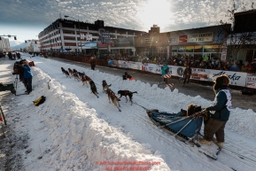 Lev Shvarts leaves the 4th avenue start line during the ceremonial start of the 2019 Iditarod in downtown Anchorage, Alaska on Saturday March 2.Photo by Jeff Schultz/  (C) 2019  ALL RIGHTS RESERVED