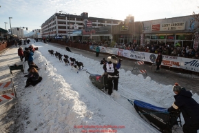 Jessie Royer leaves the start line on 4th avenue during the ceremonial start of the 2019 Iditarod in downtown Anchorage, Alaska on Saturday March 2.Photo by Jeff Schultz/  (C) 2019  ALL RIGHTS RESERVED