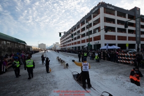 Linwood Fiedler runs down 4th Avenue during the ceremonial start of the 2019 Iditarod in downtown Anchorage, Alaska on Saturday March 2.Photo by Jeff Schultz/  (C) 2019  ALL RIGHTS RESERVED