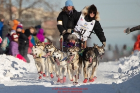 Alison Lifka and team and Iditarider run down Cordova Street during the ceremonial start of the 2019 Iditarod in downtown Anchorage, Alaska on Saturday March 2.Photo by Jeff Schultz/  (C) 2019  ALL RIGHTS RESERVED